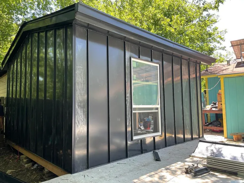 Black standing seam metal wall panels for Metal Roof Installation in Mason